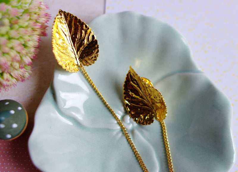 pin's col feuilles