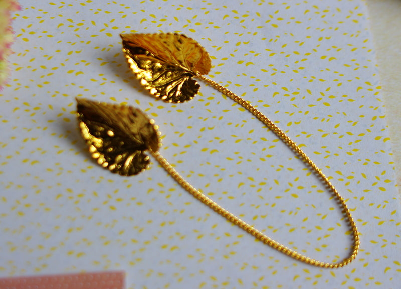 pin's col feuilles