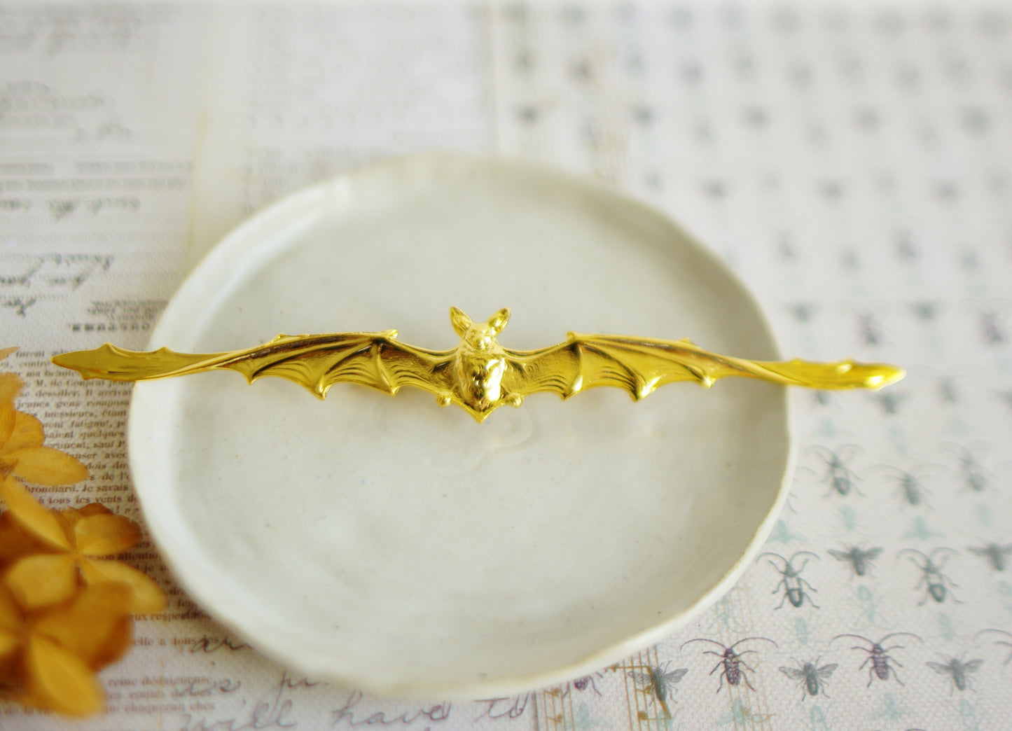 Broche chauve souris