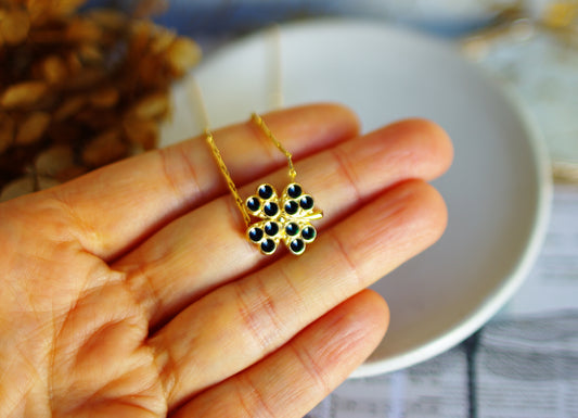 pendentif porte bonheur